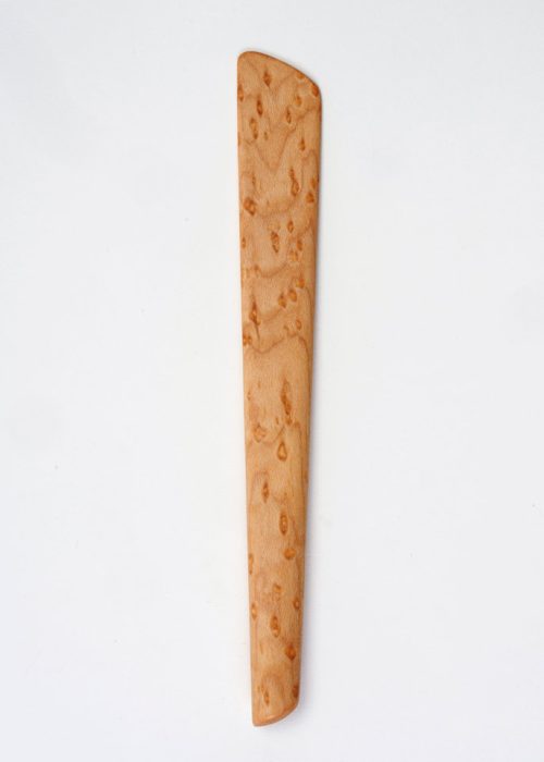 A birdseye maple pâté spreader handmade by artist Edward Wohl.