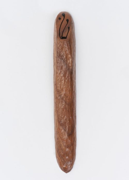A hand-carved textured walnut mezuzah by Eddie Aaronson of Windthrow.