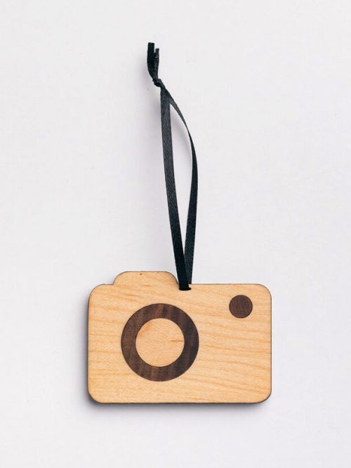 Wooden camera ornament handmade from walnut and maple by Collin Garrity.