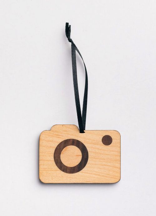 Wooden camera ornament handmade from walnut and maple by Collin Garrity.