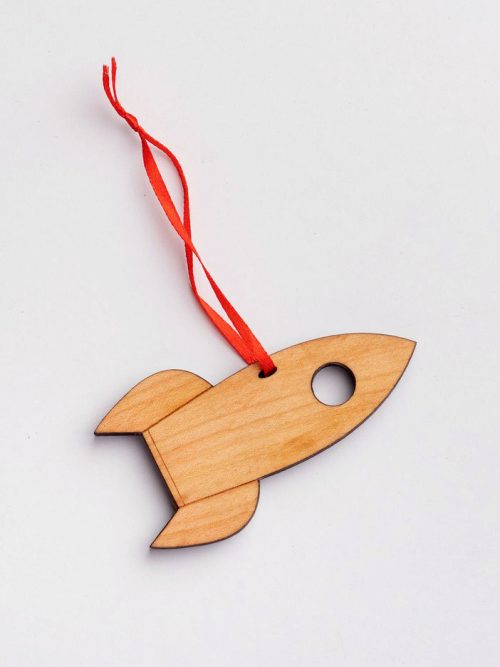 Wooden rocketship ornament by Collin Garrity.