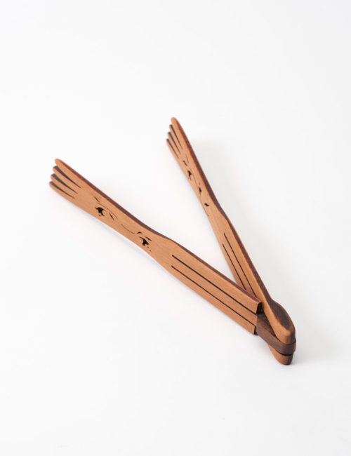 Small flower tongs in the open position, handcrafted from cherry wood by Moonspoon.