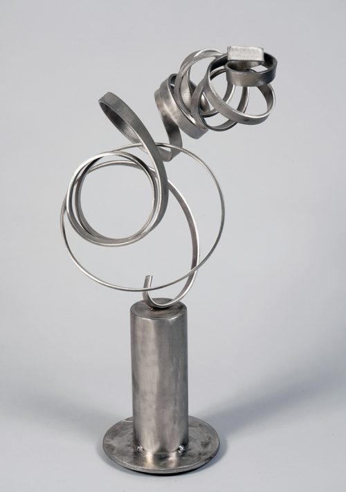 Small stainless steel abstract outdoor sculpture by Aldon Addington.
