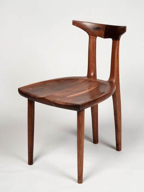 Handmade walnut chair by North Carolina artist Ken Hicks.