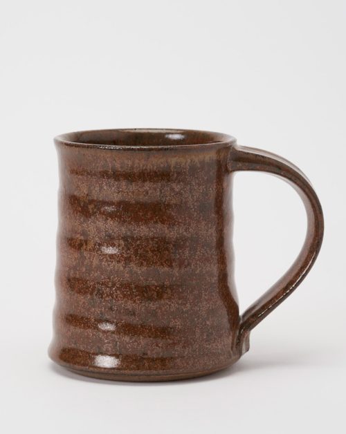 Handmade mug with a gold dust glaze by Steve Tubbs.