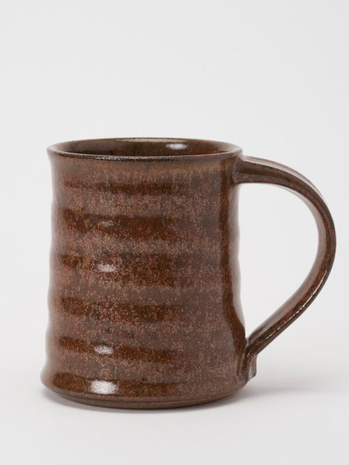 Handmade mug with a gold dust glaze by Steve Tubbs.