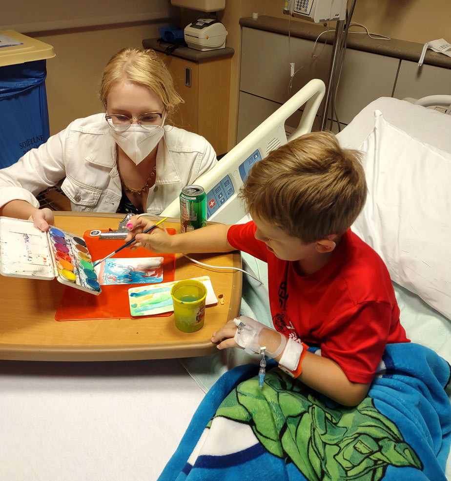 Patient receiving art lessons from Arts For Life.