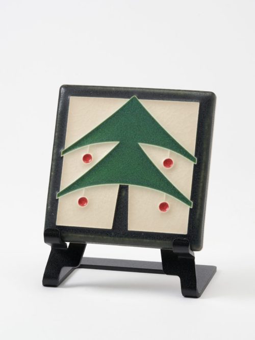 A ceramic art tile by Motawi Tileworks featuring a Christmas tree in peppermint.
