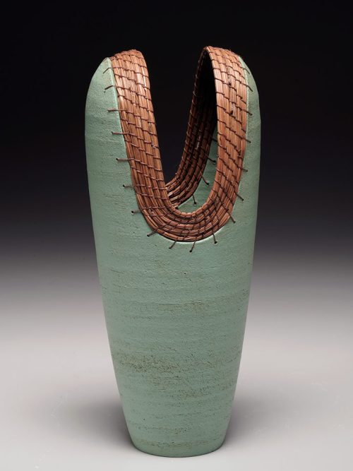 Tall Slice Heart Vase made from clay and pine needles by Hannie Goldgewicht.
