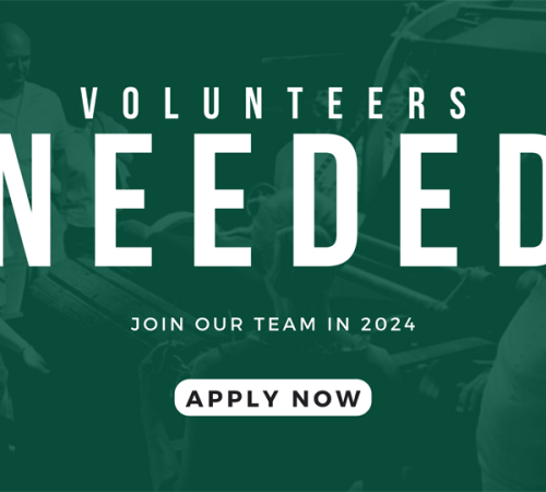 A volunteers needed sign.