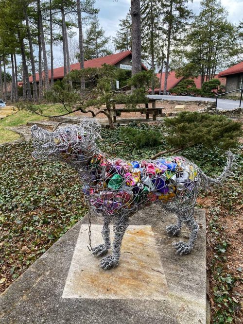 Wire dog sculpture.