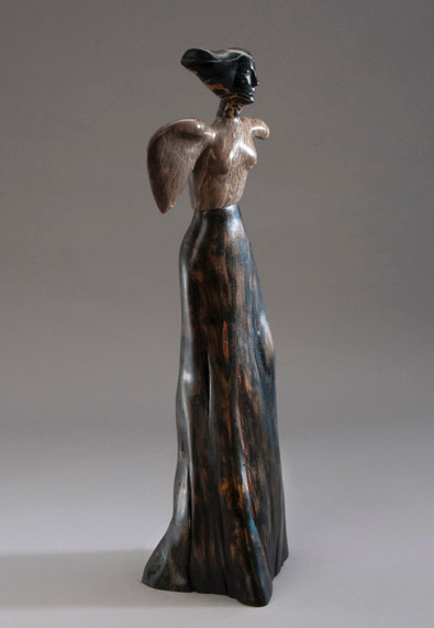 Stone and cypress sculpture of a winged woman titled Raphaela by Jane Jaskevich.