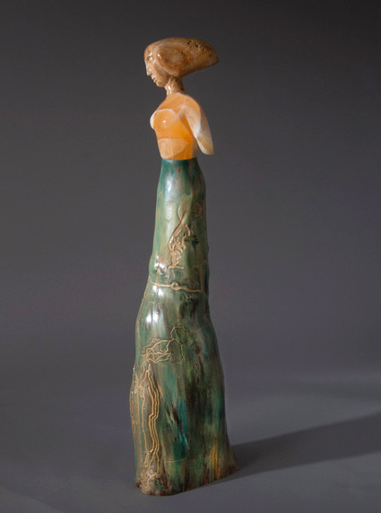 A cypress and stone sculpture titled Nora by North Carolina artist Jane Jaskevich.