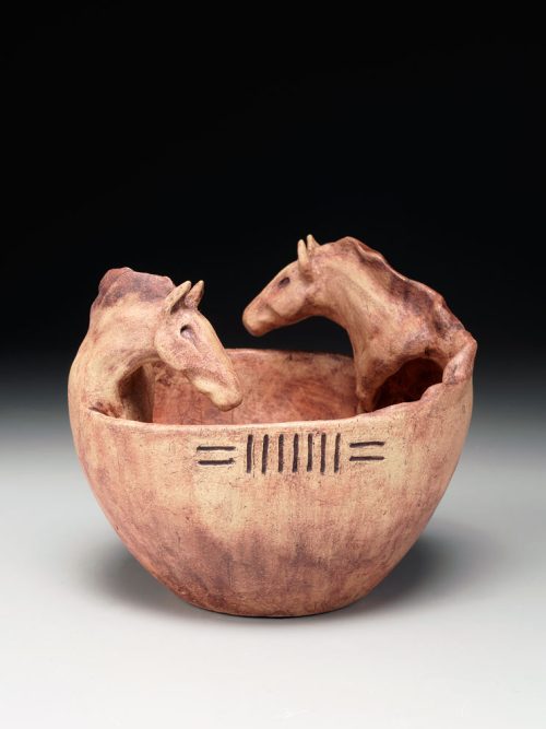 Double head ceramic horse bowl by artist Tina Curry.