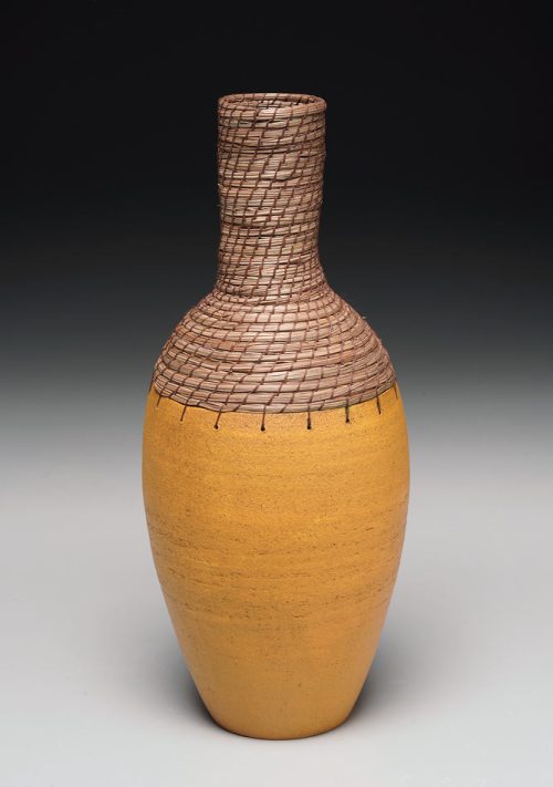Ceramic bottle vessel by with pine needle basketry by Hannie Goldgewicht.