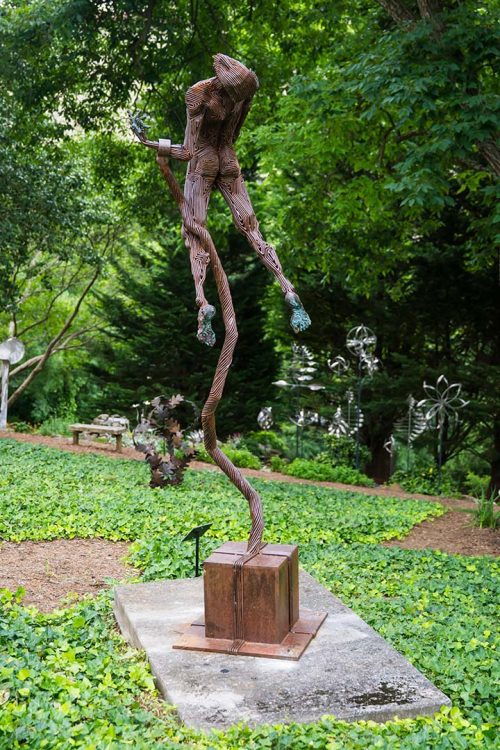 An outdoor sculpture titled Tethered by J. Aaron Alderman.