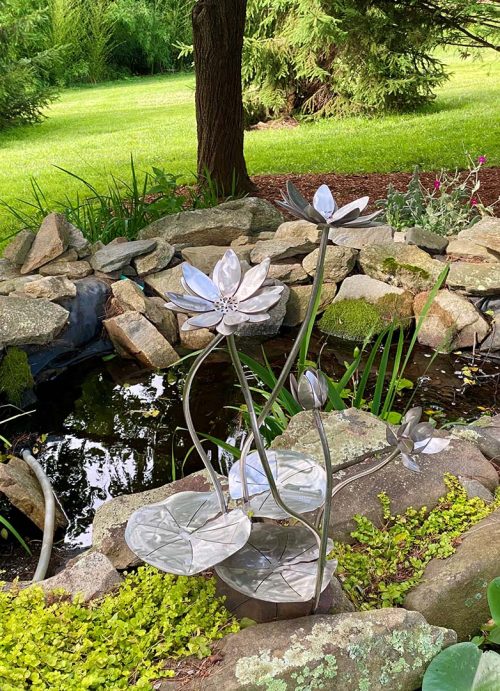 Outdoor sculpture or yard art titled Lotus by Bob Doster.