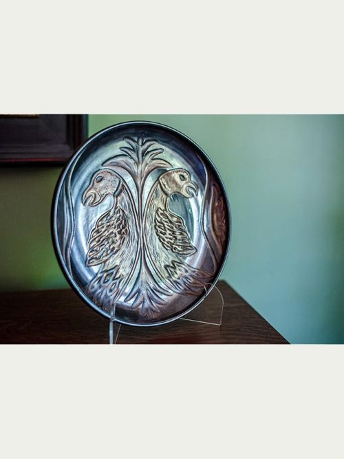 Griffin plate by Leslie Green Guilbault.