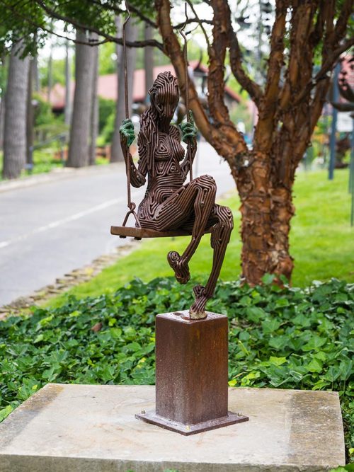 An outdoor sculpture by J. Aaron Alderman titled She Came to Me in Spring.