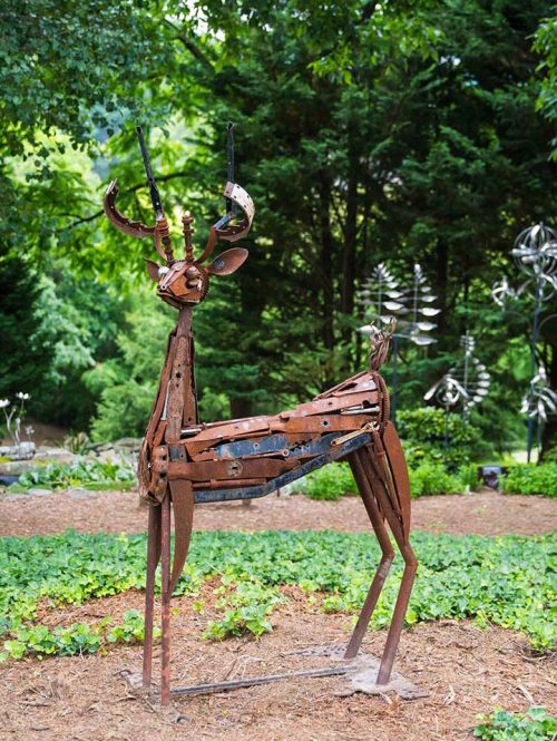 An outdoor scrap metal sculpture titled Sarah's Deer by artist Jonathan Bowling.