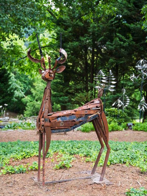An outdoor scrap metal sculpture titled Sarah's Deer by artist Jonathan Bowling.