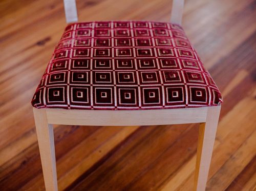 Detail of a maple dining chair seat.