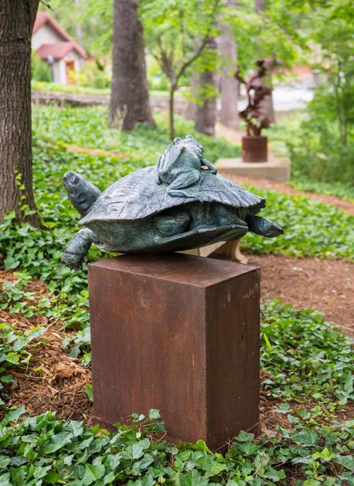 A cast bronze limited edition sculpture by Roger Martin titled The Interloper.