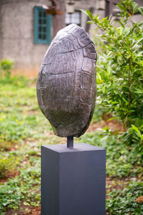 An outdoor sculptur by Roger Martin that was cast in bronze.