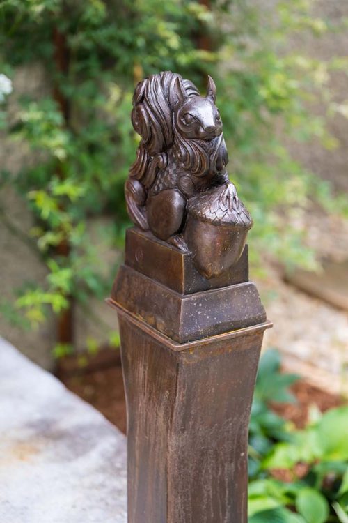 Bronze and steel squirrel sculpture by artist Todd Frahm.