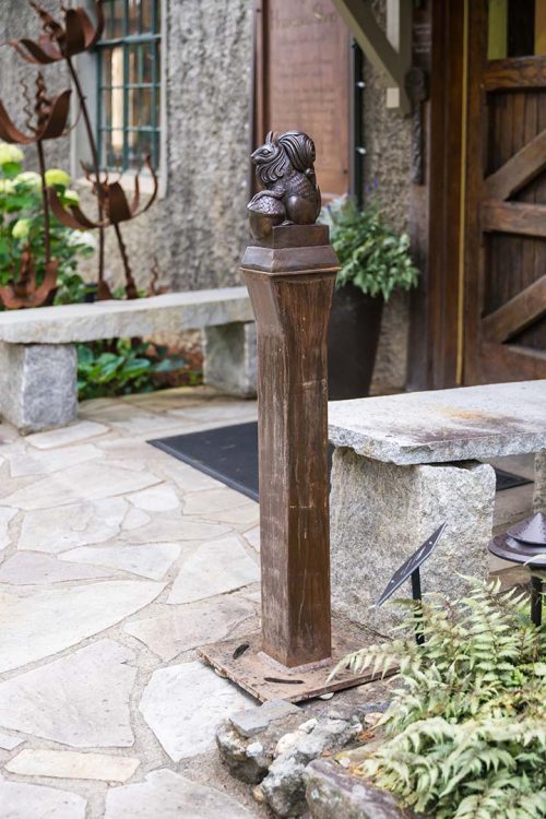 Bronze and steel squirrel sculpture by artist Todd Frahm.