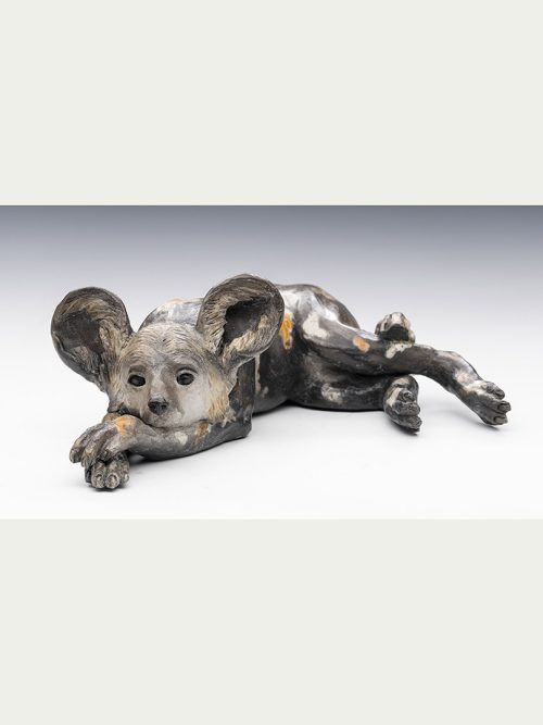 African wild dog pup sculpture by artist Tina Curry.