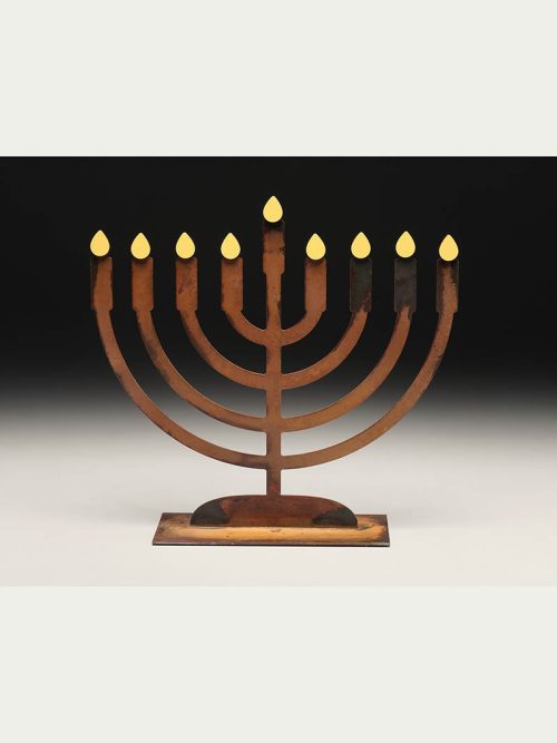 Metal menorah with flames by Prairie Dance.