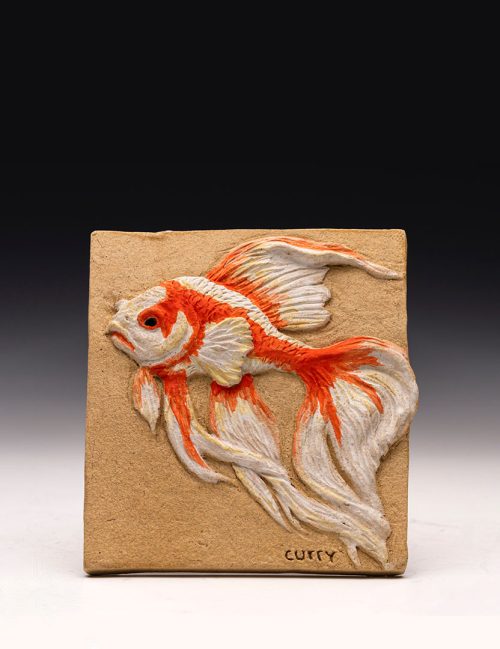 Guppy relief tile by artist Tina Curry.