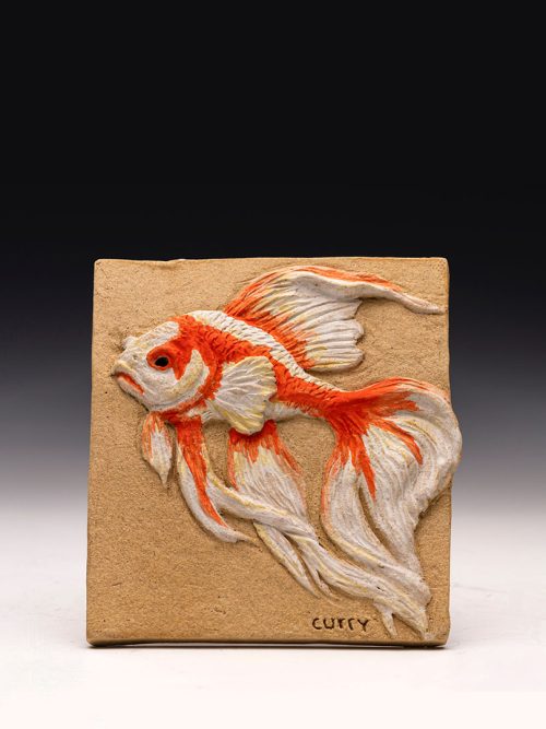 Guppy relief tile by artist Tina Curry.