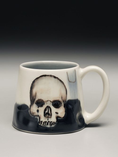 Porcelain skull mug by artist Phil Haralam.