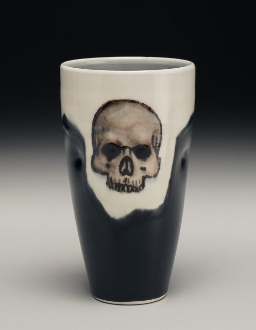 Porcelain skull tumbler by Phil Haralam.
