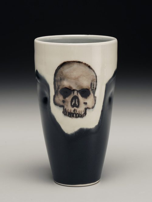 Porcelain skull tumbler by Phil Haralam.