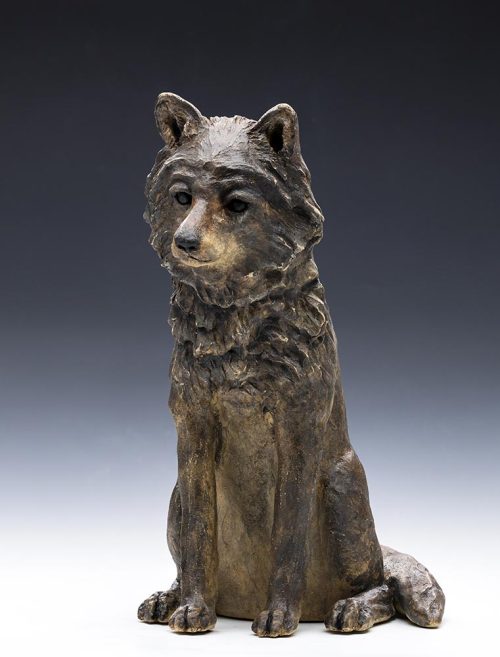 A wolf pup sculpture titled Night Howl by Tina Curry.