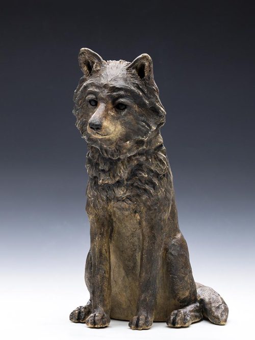 A wolf pup sculpture titled Night Howl by Tina Curry.