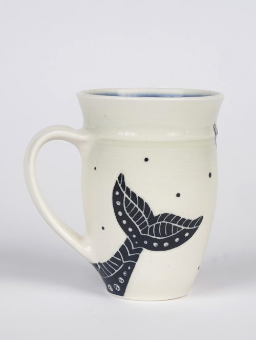 Ceramic darkstar narwhal mug by Asheville artist Anja Bartels.