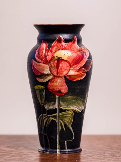 Red and black vintage floral vase by Leslie Green Guilbalt.