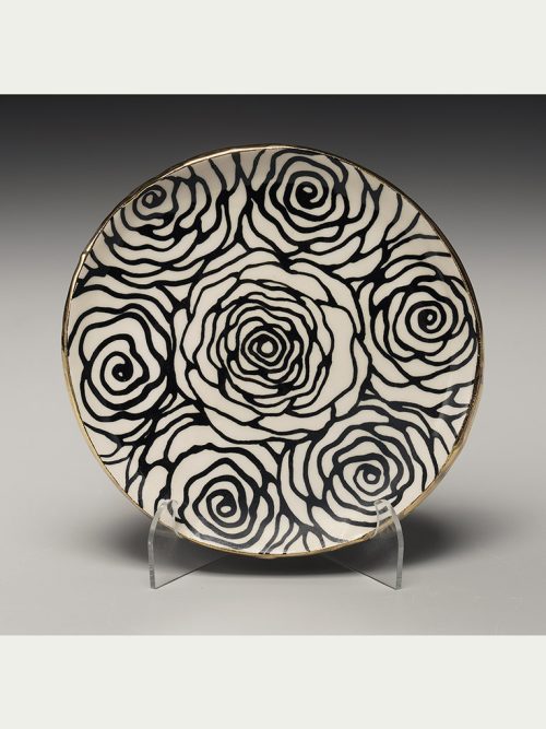 Stoneware floral plate by Nicole Hsieh.
