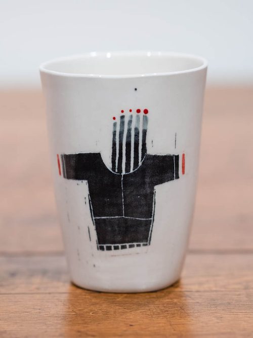 Porcelain shirt cup by Asheville artist Lisa Gluckin.