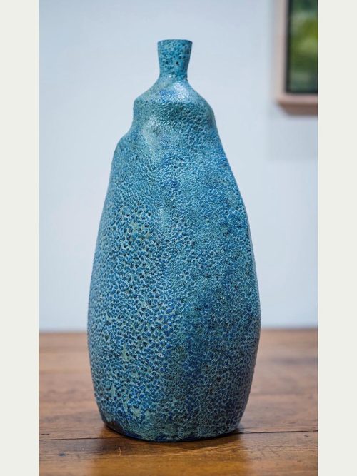 Pebbled sculptural vase by artist Robert Milnes.