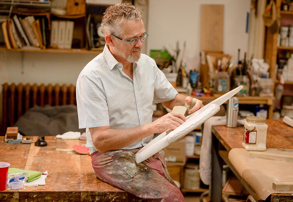 Fine furniture maker Brent Skidmore in his Grovewood Village studio.