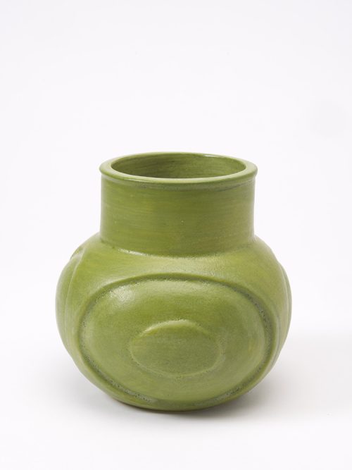 Carved green vase by ceramic artist Leslie Green Guilbault.