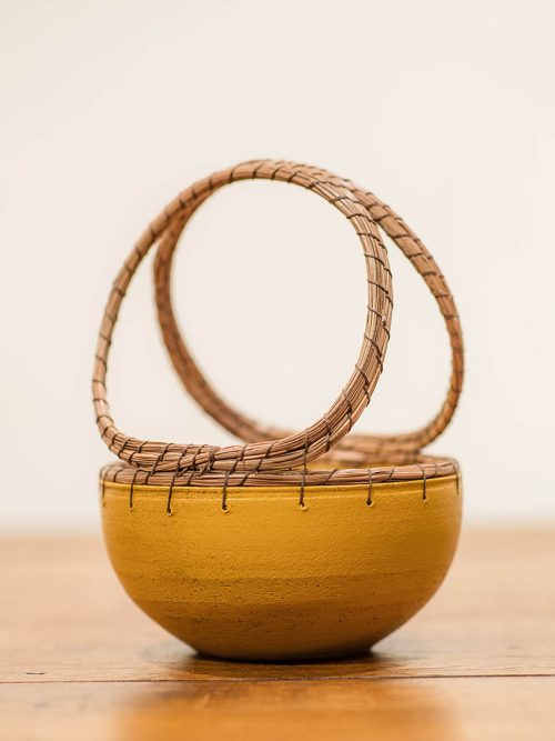Ochre basket by Hannie Goldgewicht.