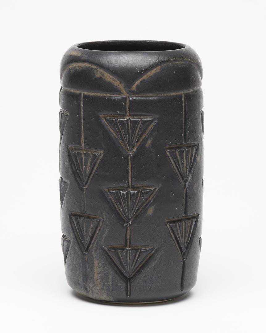 Handcarved ceramic gunmetal vase by artist Leslie Green Guilbault.