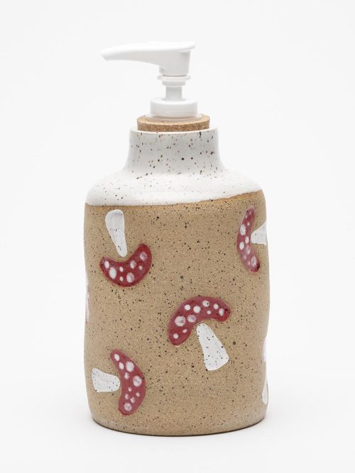 Handmade by Osso Ceramics in Philadelphia, this mushroom-stamped stoneware soap dispenser blends playful woodland charm with functional everyday design.