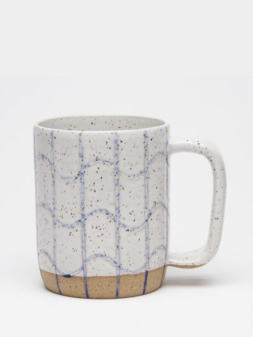 The Osso Ceramics "Poolside" mug is a handcrafted, wheel-thrown stoneware mug featuring a distinctive hand-carved grid pattern with straight vertical lines and a wavy, squiggle design.